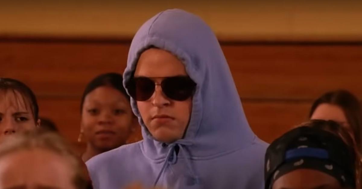 Daniel Franzese as Damian in Mean Girls, wearing a hooded sweatshirt and sunglasses