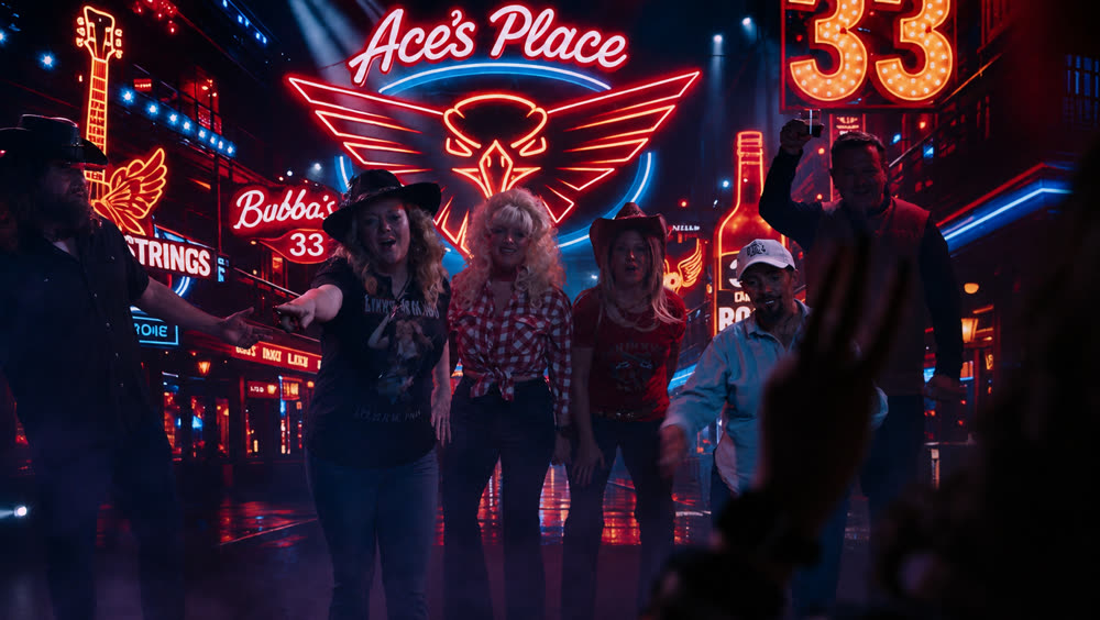 A neon roadhouse bar built on the LED wall