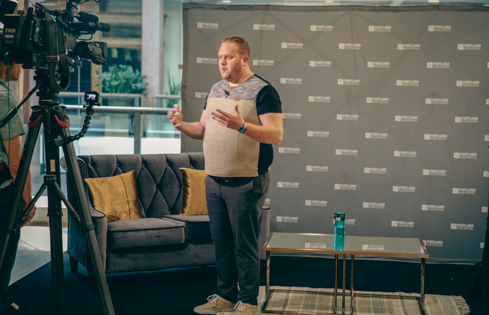 Director Zach Meiners speaking to cameras at the Portland Film Festival promoting the film Conversion.