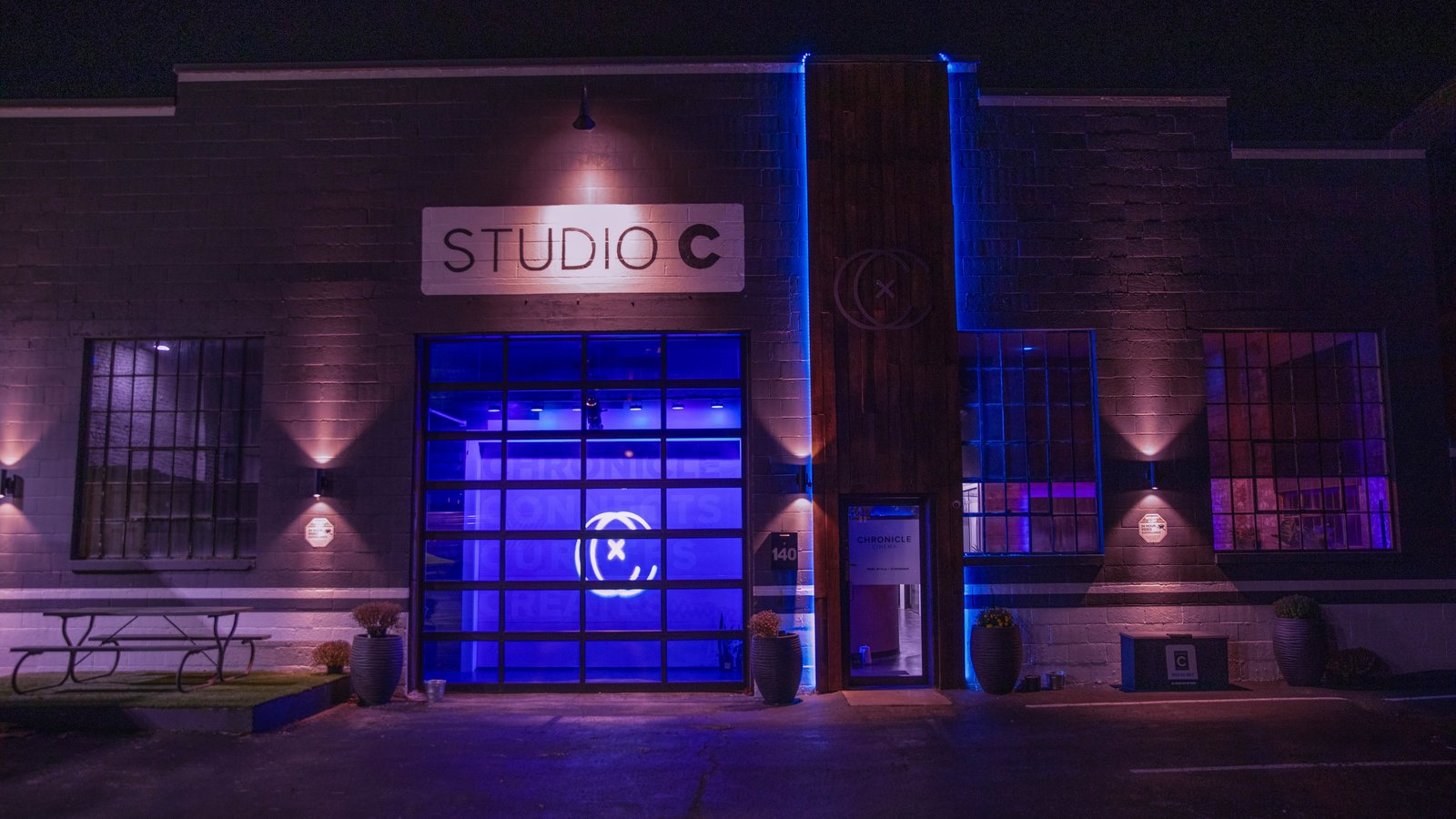 The exterior of Studio C in Jeffersonville, Indiana, lit at night.