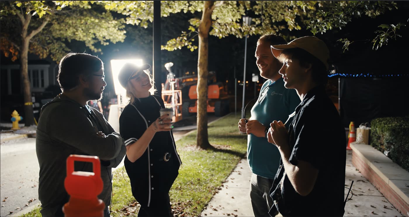 Behind the scenes on the Hallmark Winter Walk shoot with producer Zach Meiners, art PA Eric Spurgeon, producer Joshua Covington, and Jo Hall.