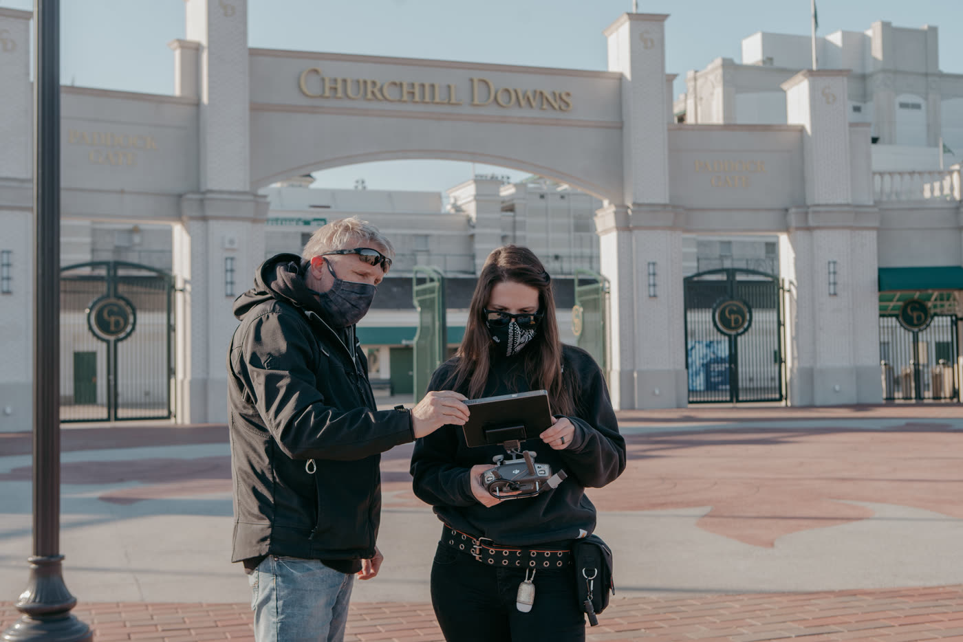 Chronicle Team members flying the drone at Churchills Downs for the the Woodford Reserve Derby ad.